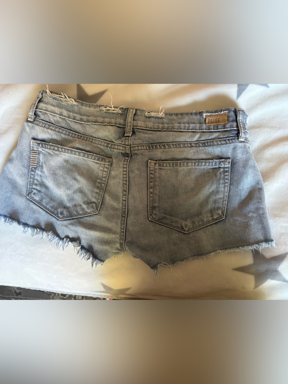 PAIGE Light Wash Frayed Denim Shorts